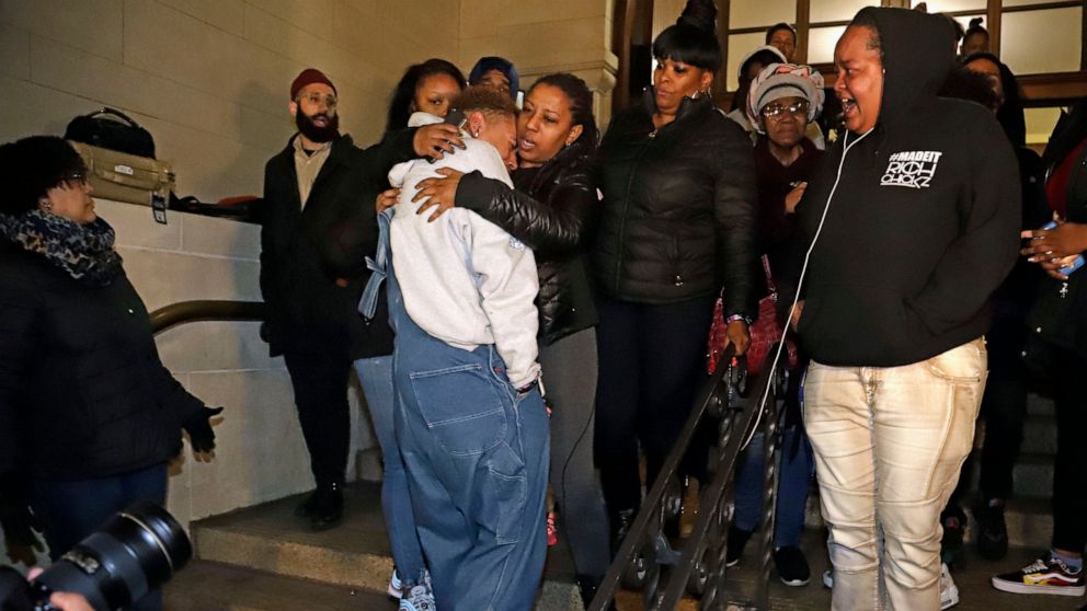 Michelle Kenney, center, the mother of Antwon Rose II, leaves the Allegheny County Courthouse with supporters after hearing the verdict of not guilty on all charges for Michael Rosfeld, a former police officer in East Pittsburgh, Pa., Friday, March 22, 2019.