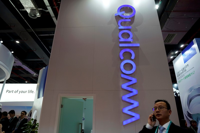 FILE PHOTO: A Qualcomm sign is seen during the China International Import Expo (CIIE), at the National Exhibition and Convention Center in Shanghai,