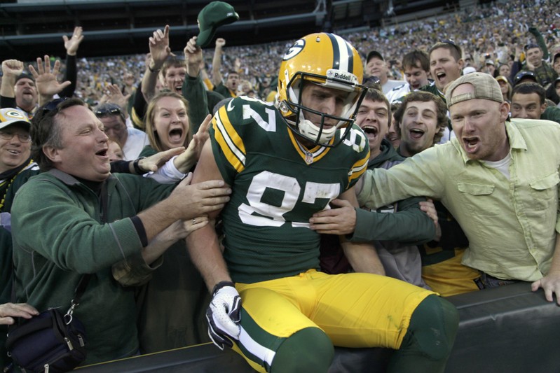 FILE PHOTO - Green Bay Packers Nelson celebrates the game-winning touchdown against the New Orleans Saitns during their NFL football game in Green Bay