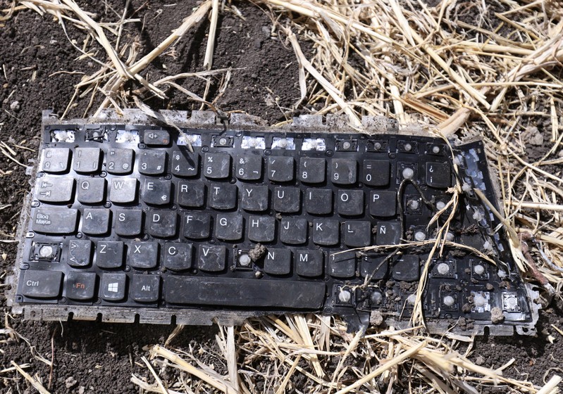 A laptop keyboard is seen at the scene of the Ethiopian Airlines Flight ET 302 plane crash, near the town of Bishoftu