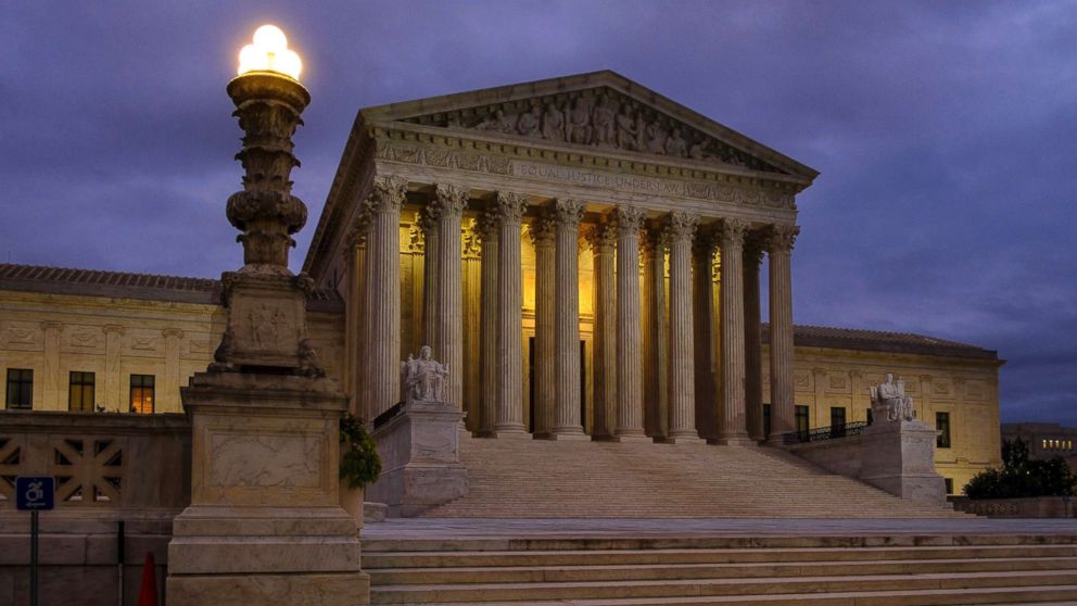The U.S. Supreme Court building stands before dawn in Washington, D.C., Oct. 5, 2018.