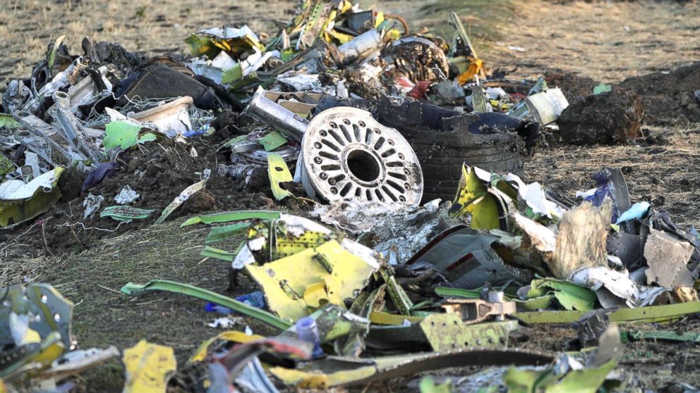 Parts of the landing gear lay in a pile after being gathered by workers during the continuing recovery efforts at the crash site of Ethiopian Airlines flight ET302 on March 11, 2019, in Bishoftu, Ethiopia.