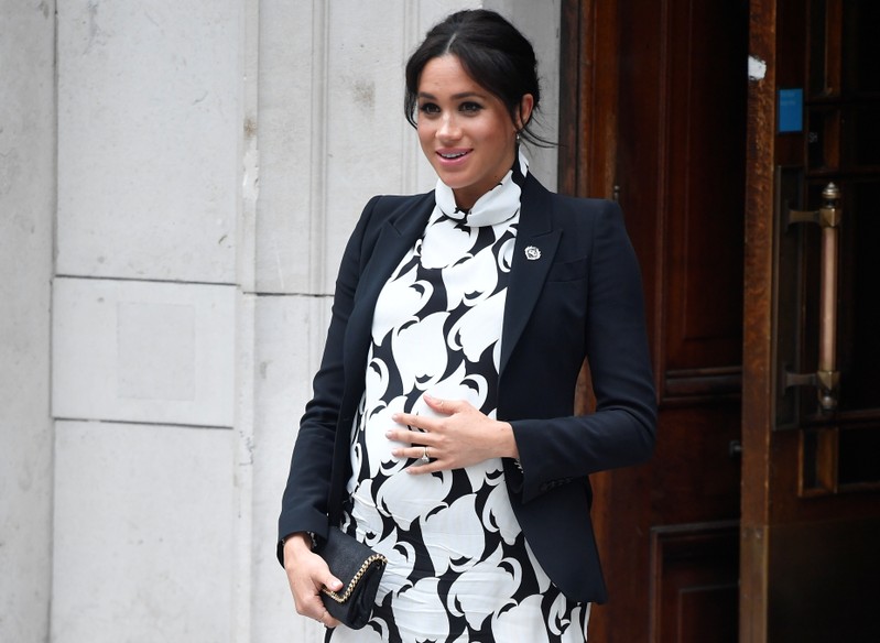 Britain's Meghan, Duchess of Sussex, leaves after an International Women's Day panel discussion at King's College London