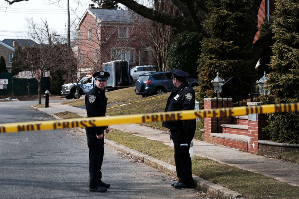 Police stand along the street where reputed mob boss Francesco "Franky Boy" Cali lived and was gunned down on March 14, 2019 in the Todt Hill neighborhood of the Staten Island borough of New York City.