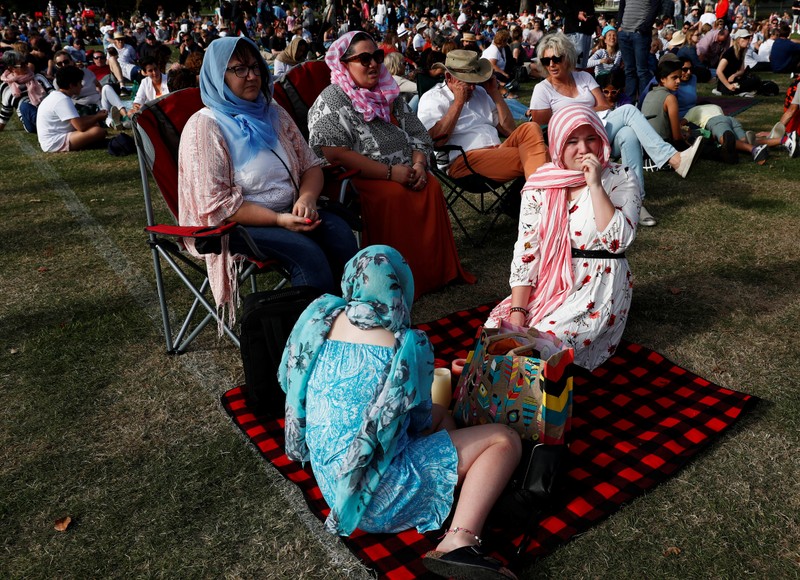 People attend a vigil for victims of the mosque shootings in Christchurch