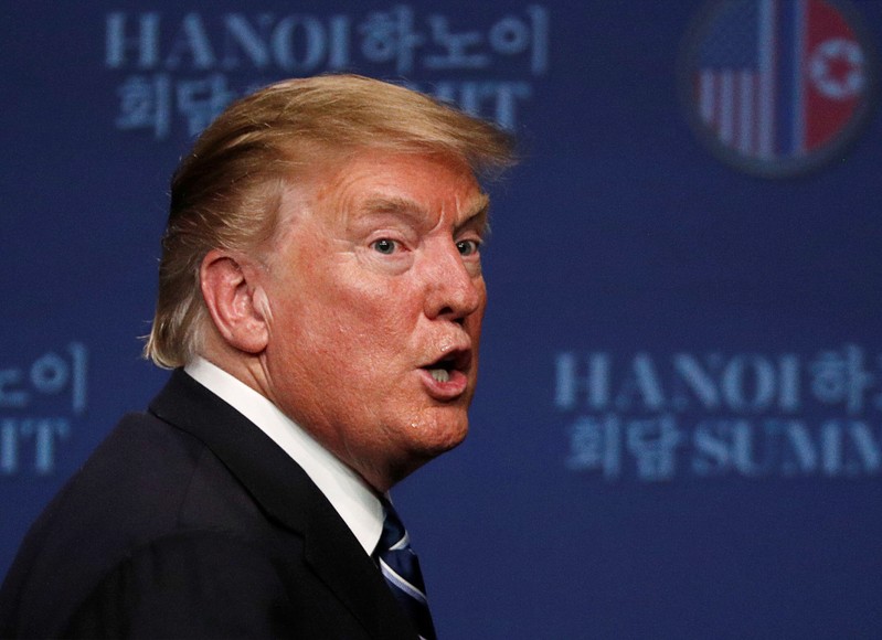 FILE PHOTO - U.S. President Donald Trump reacts during a news conference after his summit with North Korean leader Kim Jong Un, at the JW Marriott Hotel in Hanoi