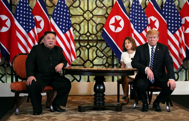 FILE PHOTO: North Korean leader Kim Jong Un and U.S. President Donald Trump listen to questions from the media during the one-on-one bilateral meeting at the second North Korea-U.S. summit in the Metropole hotel in Hanoi