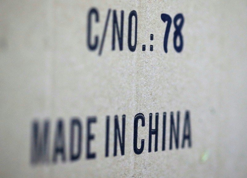 FILE PHOTO: Words 'Made in China' are pictured on a box of products imported from China at a wholesale shop in Paris