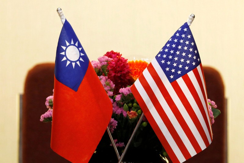 FILE PHOTO: Flags of Taiwan and U.S. are placed for a meeting between U.S. House Foreign Affairs Committee Chairman Ed Royce speaks and with Su Chia-chyuan, President of the Legislative Yuan in Taipei