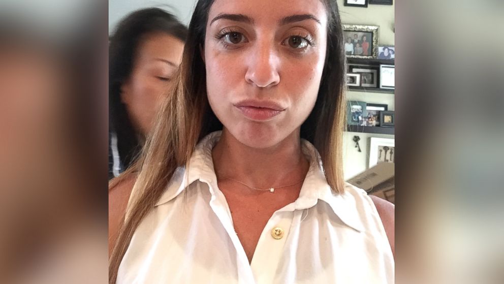 The last photo of Karina Vetrano at her Howard Beach home moments before leaving for a jog, Aug. 2, 2016, with her mother in the background.