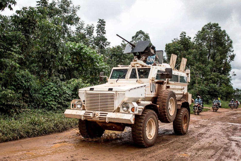 A military truck for the United Nations Organization and Stabilization Mission in the Democratic Republic of the Congo (MONUSCO) patrols the road linking Beni to Mangina, Aug. 23, 2018, in the Democratic Republic of the Congo.