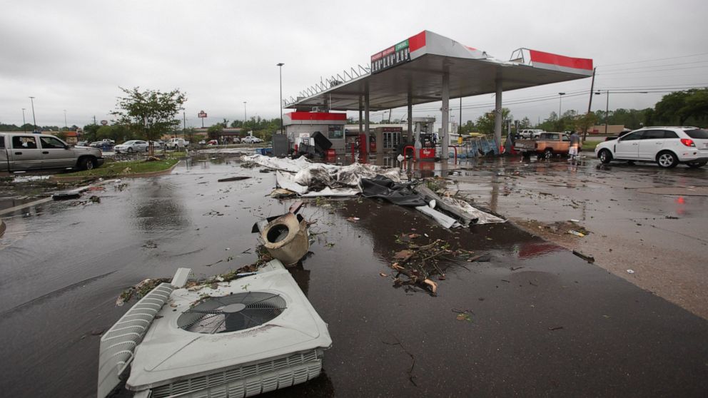 A gas station is damaged following severe weather, Saturday, April 13, 2019 in Vicksburg, Miss. Authorities say a possible tornado has touched down in western Mississippi, causing damage to several businesses and vehicles.