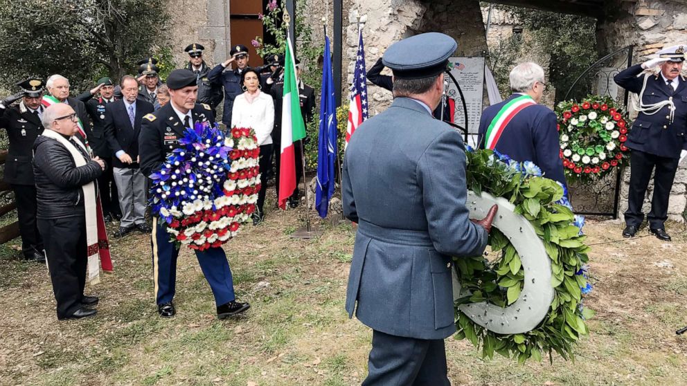 Local dignitaries, international residents and military authorities at the commemorative ceremony at Montebuono, Italy.