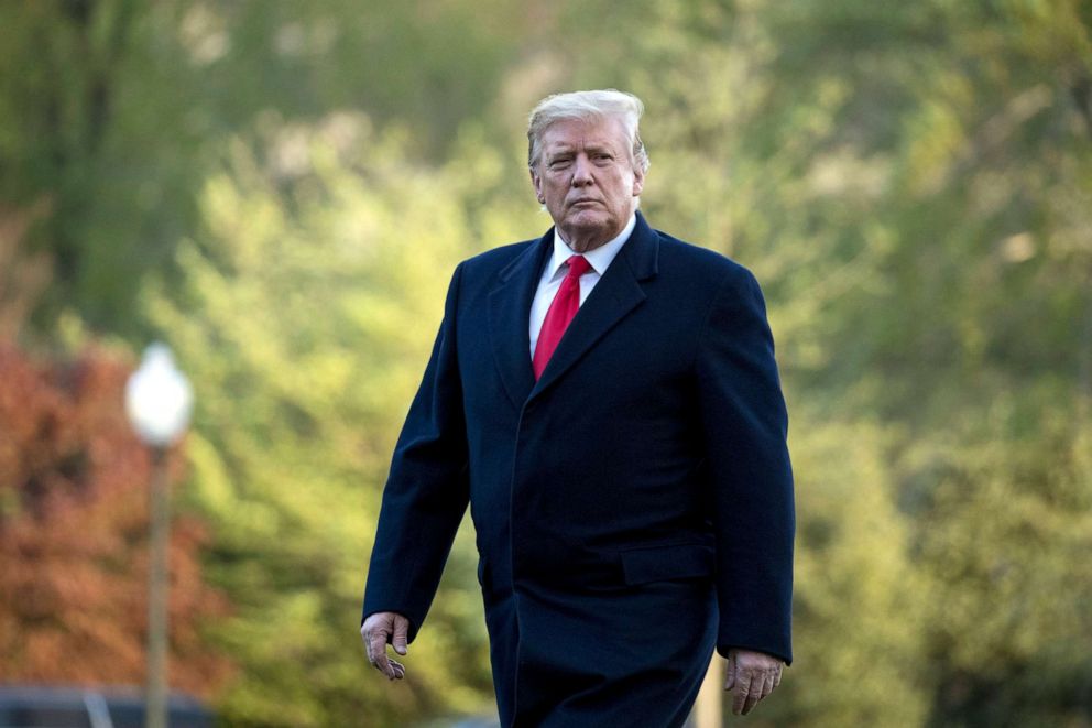 President Donald Trump walks on the South Lawn as he arrives at the White House in Washington, April 15, 2019, after visiting Minnesota.