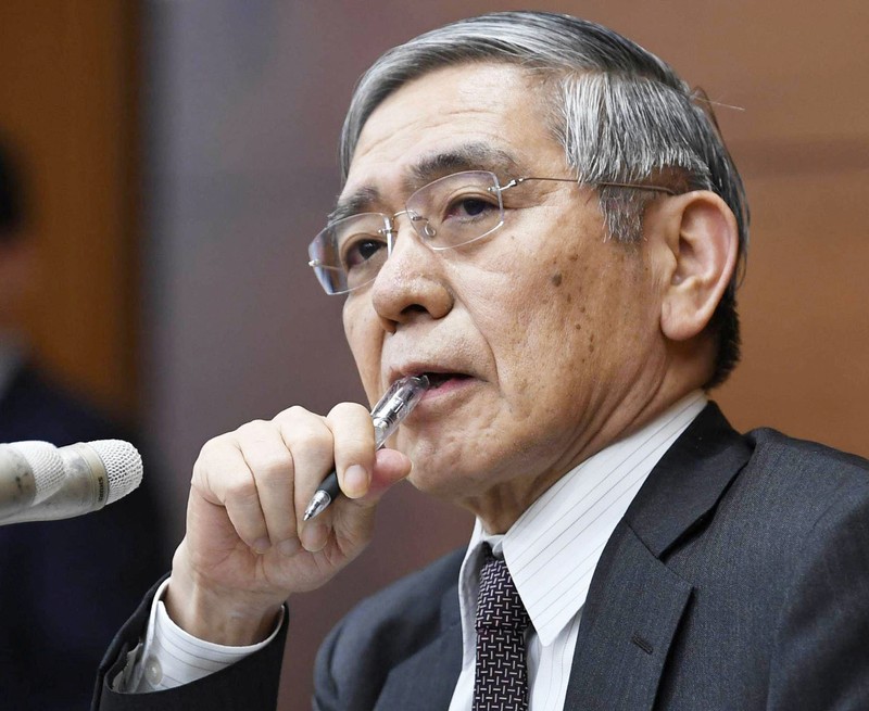 FILE PHOTO: BOJ Governor Kuroda attends a news conference in Tokyo