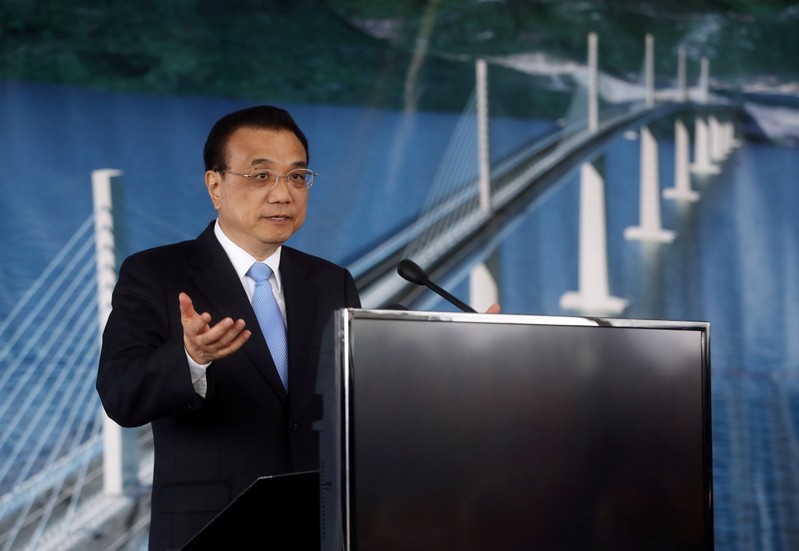 Chinese Prime Minister Li Keqiang speaks during ceremony at the construction site of the Peljesac Bridge in Brijesta