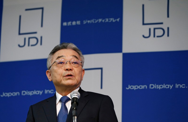 Japan Display Inc's Chief Executive Nobuhiro Higashiiriki attends a news conference in Tokyo