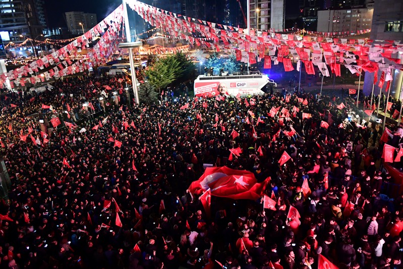 Supporters of the main opposition CHP gather in front of the party's headquarters to celebrate the municipal elections results in Ankara