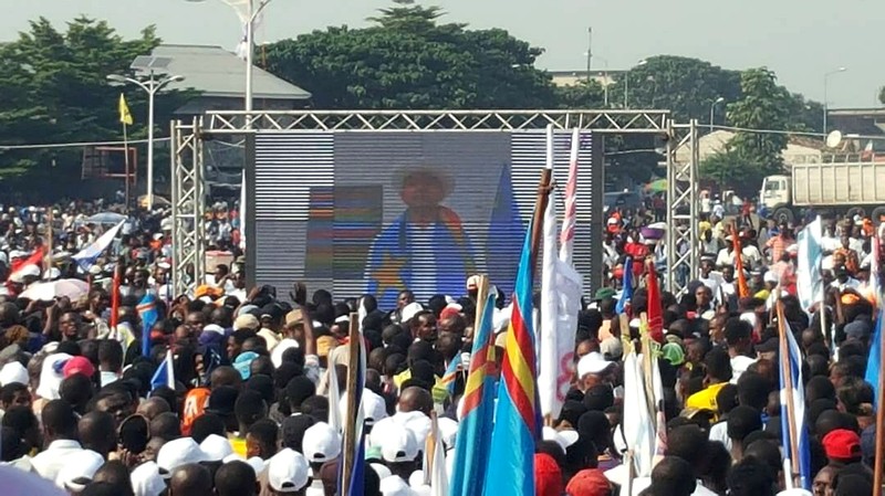 FILE PHOTO: Supporters of Congolese exiled opposition leader Moise Katumbi gather to watch his address via a video link in Kinshasa