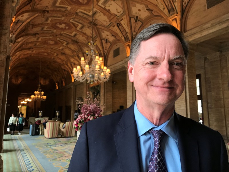 Charles Evans, president of the Federal Reserve Bank of Chicago, poses for a photo in Palm Beach