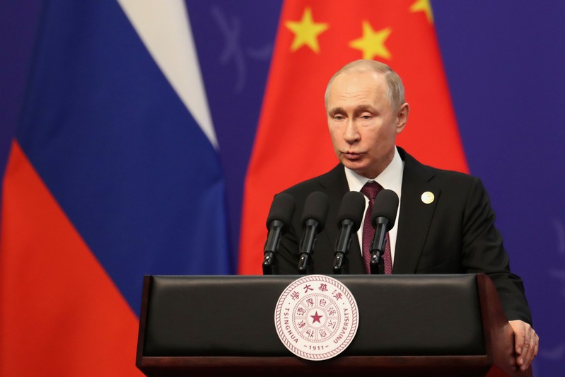 Russian President Vladimir Putin gives a speech during the Tsinghua University’s ceremony at Friendship Palace in Beijing