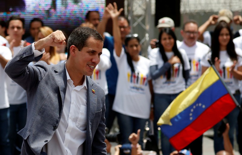Venezuelan opposition leader Juan Guaido takes part in a swearing-in ceremony for supporters in Caracas