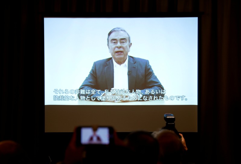 A video statement made by the former Nissan Motor chairman Carlos Ghosn is shown on a screen during a news conference by his lawyers at Foreign Correspondents' Club of Japan in Tokyo