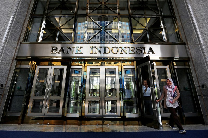 FILE PHOTO: Visitors leave Bank Indonesia headquarters in Jakarta, Indonesia
