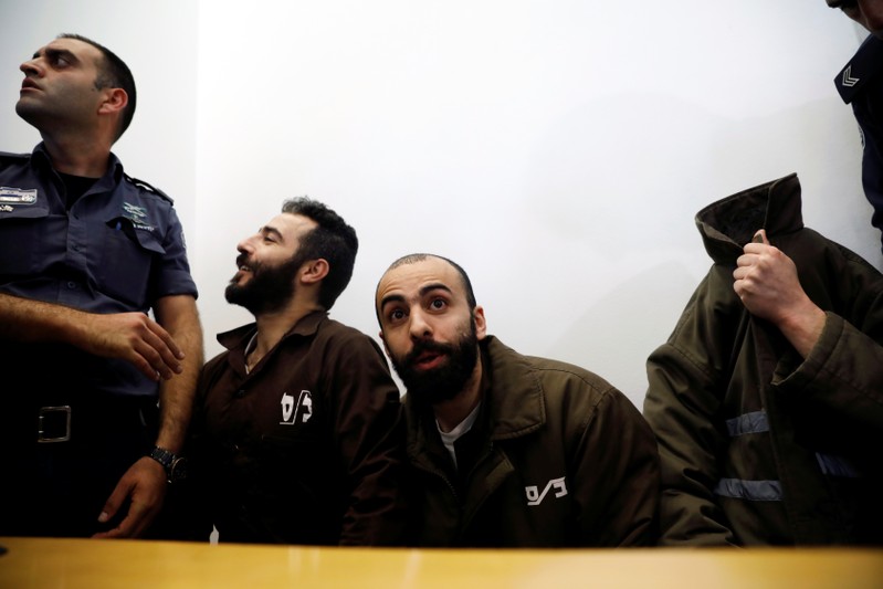 FILE PHOTO - Romain Franck, an employee of the French consulate-general in Jerusalem, appears with co-defendants in the district court in Beersheba