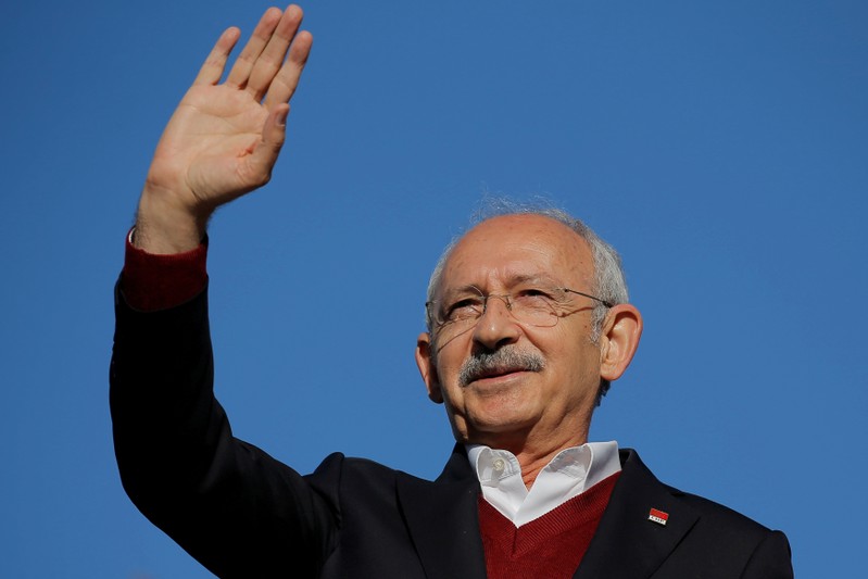FILE PHOTO: Kemal Kilicdaroglu, the leader of the main opposition Republican People's Party (CHP), greets his supporters during a rally for the upcoming local elections, in Istanbul