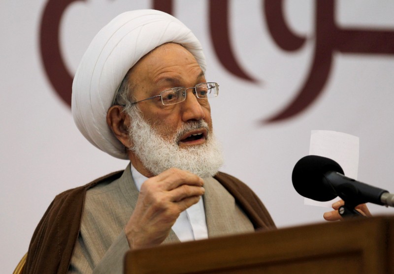 FILE PHOTO - Bahrain's leading Shi'ite cleric Isa Qassim gives a rare speech as a translator is seen behind him at Saar Mosque, west of Manama in this file photo