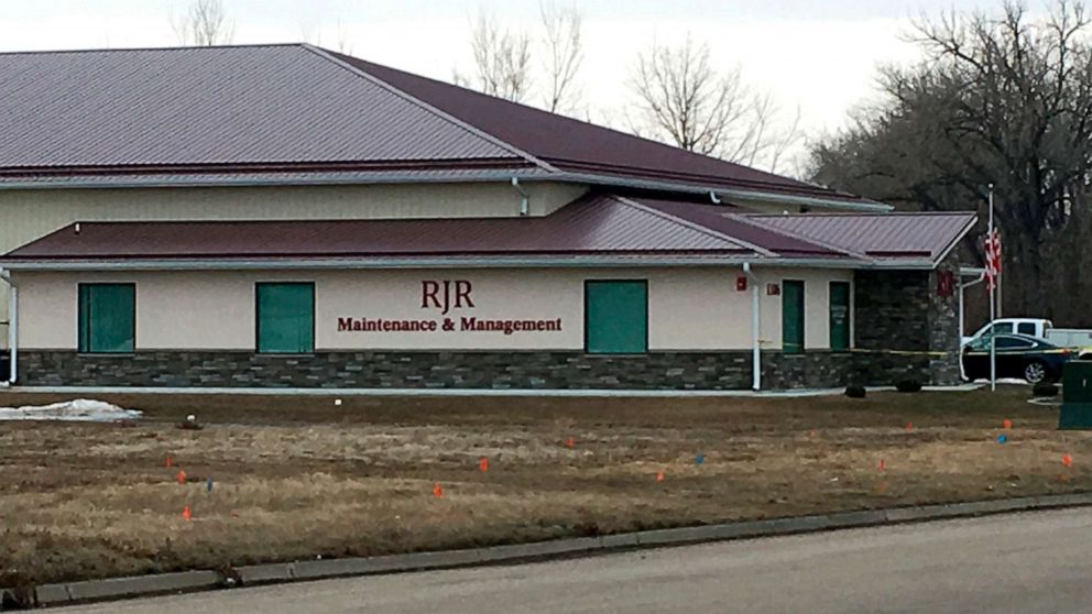 Cars are parked outside RJR Maintenance and Management in Mandan, N.D., April 1, 2019.