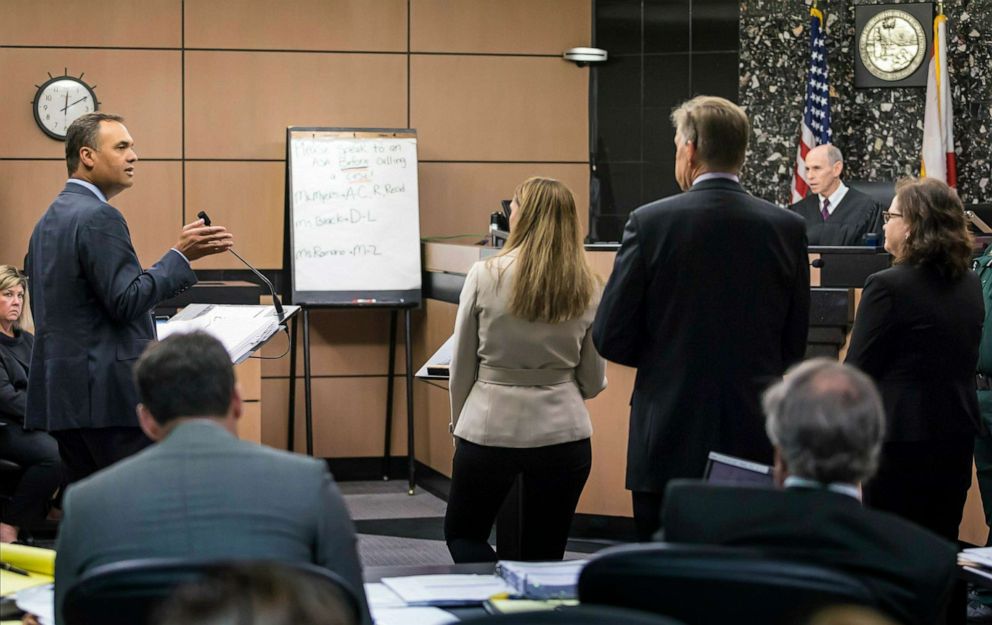 William Burck, left, one of during New England Patriots owner Robert Kraft's attorneys, addresses attorneys representing media organizations as he speaks before Judge Leonard Hanser William Burck during a hearing in Kraft's prostitution solicitation case, April 12, 2019, in West Palm Beach, Fla.