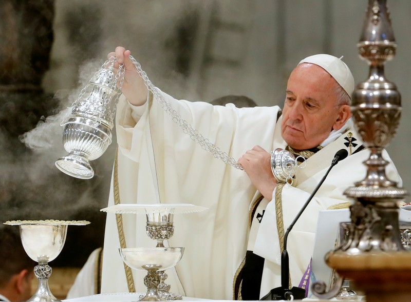 Pope Francis holds a Mass on Holy Thursday