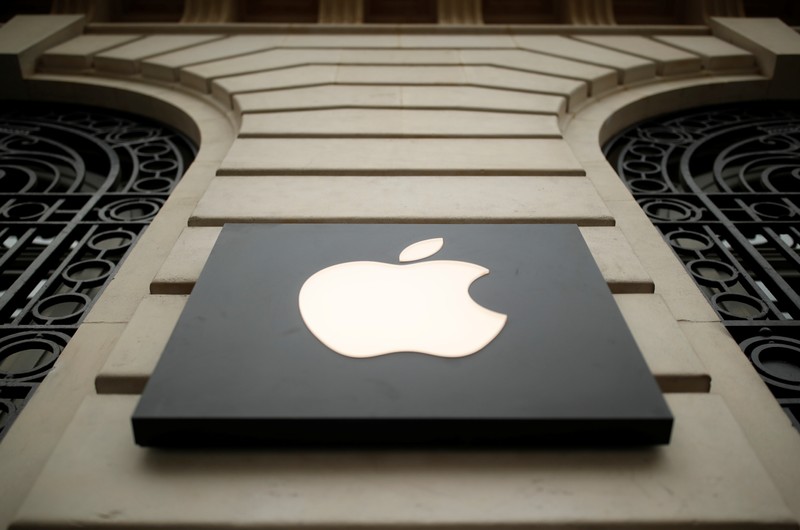 The logo of Apple company is seen outside an Apple store in Paris