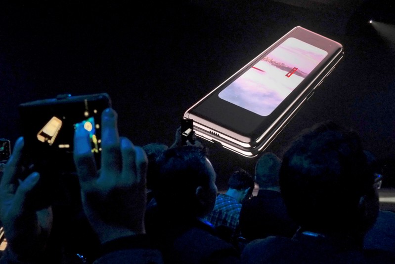 FILE PHOTO: The Samsung Galaxy Fold phone is shown on a screen at Samsung Electronics’ Unpacked event in San Francisco