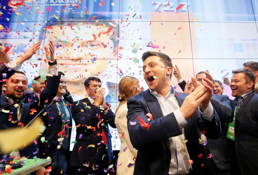 Ukrainian presidential candidate Volodymyr Zelenskiy reacts following the announcement of the first exit poll in a presidential election at his campaign headquarters in Kiev, Ukraine, April 21, 2019.