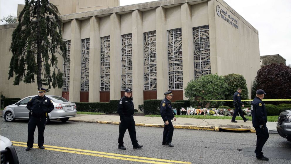 Law enforcement are positioned outside the Tree of Life Synagogue in Pittsburgh, Oct. 28, 2018.
