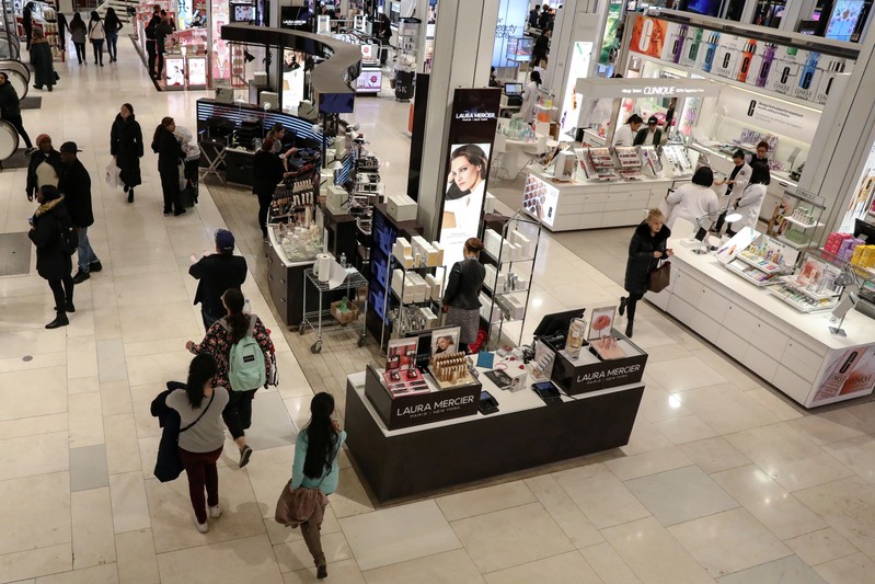 FILE PHOTO: People shop at Macy's Department store in New York