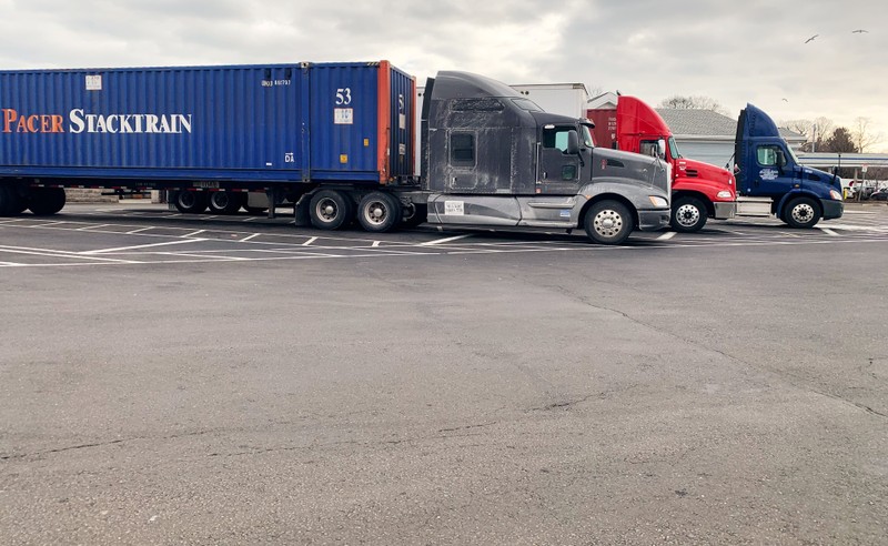 FILE PHOTO: Trucks are pictured at a truck stop along I-95 in Darien