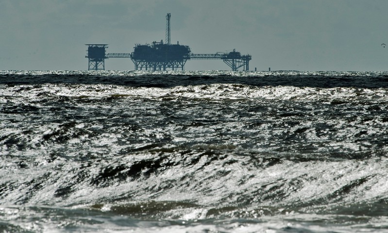 FILE PHOTO: FILE PHOTO: An oil and gas drilling platform stands offshore near Dauphin Island, Alabama