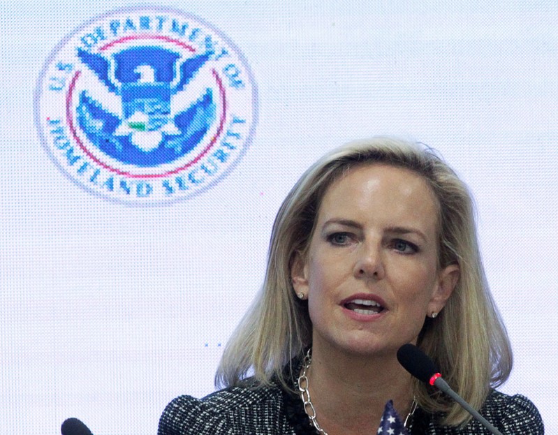 FILE PHOTO: U.S. Secretary of Homeland Security Kirstjen Nielsen speaks beside Honduras' President Juan Orlando Hernandez during a multilateral meeting at the Honduran Ministry of Security in Tegucigalpa,