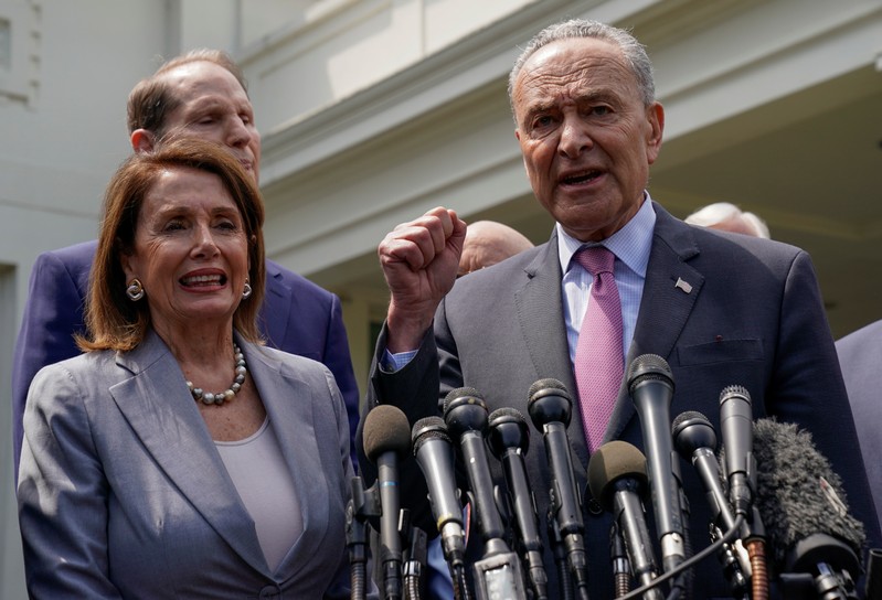 U.S. House Speaker Nancy Pelosi and Senate Democratic Leader Chuck Schumer speak to reporters after their meeting on infrastructure with U.S. President Donald Trump, at the White House in Washington