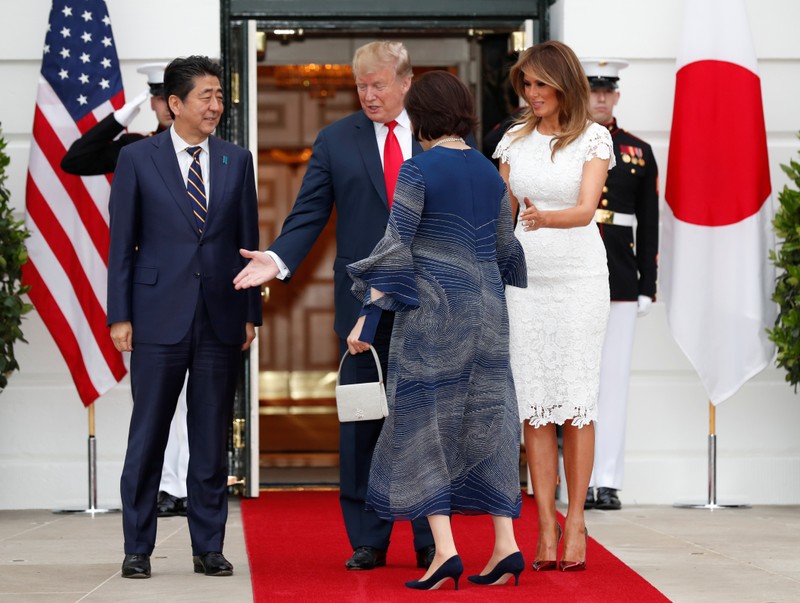 U.S. President Donald Trump and Melania Trump welcome Japan's Prime Minister Shinzo Abe and Akie Abe at the White House in Washington