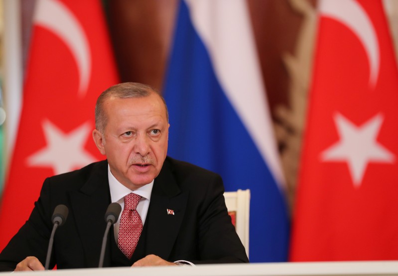 FILE PHOTO - Turkish President Erdogan speaks during a news conference in Moscow