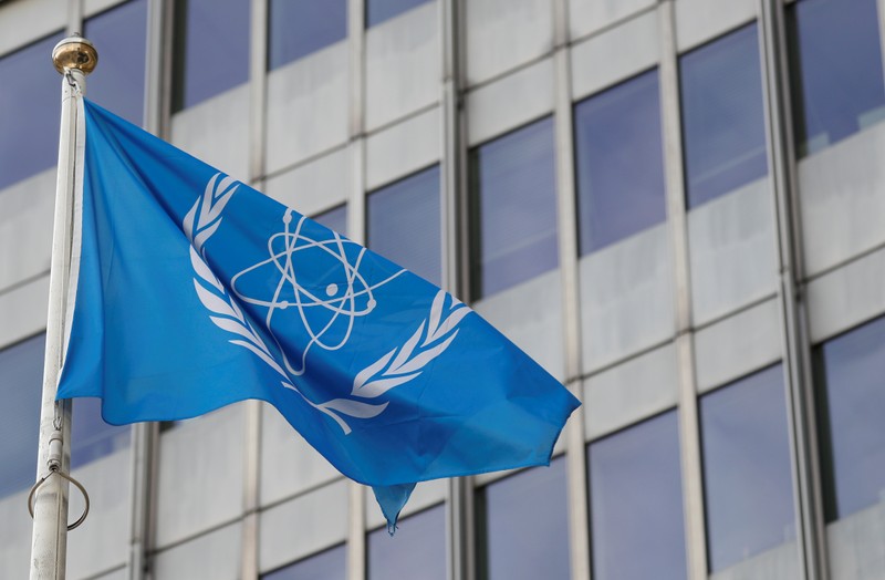 The flag of the International Atomic Energy Agency (IAEA) flutters in front of their headquarters in Vienna