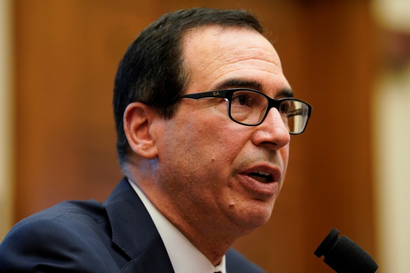 FILE PHOTO: U.S. Treasury Secretary Mnuchin testifies before a House Financial Services Committee hearing on Capitol Hill