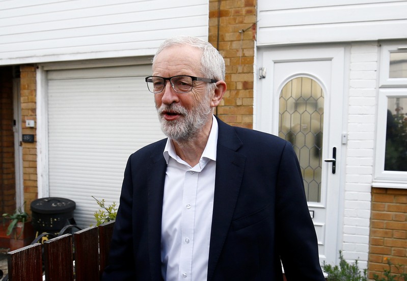 British opposition Labour Party leader Jeremy Corbyn leaves his home in London