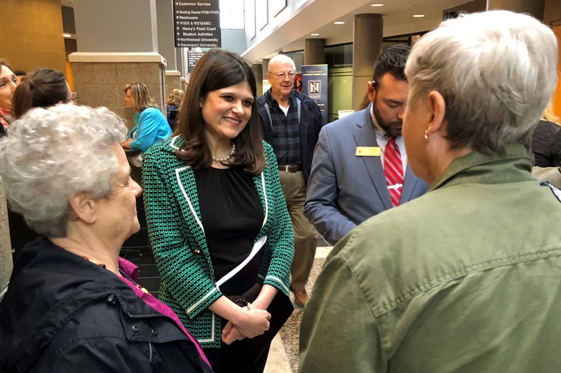 FILE PHOTO - U.S. Representative Haley Stevens speaks with constituents at a town hall meeting in Livonia