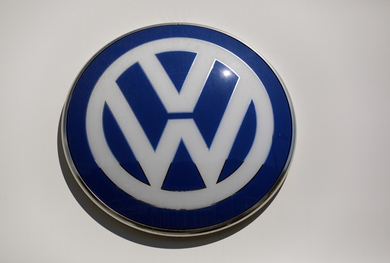 The logo of Volkswagen carmaker is seen at the entrance of a showroom in Nice